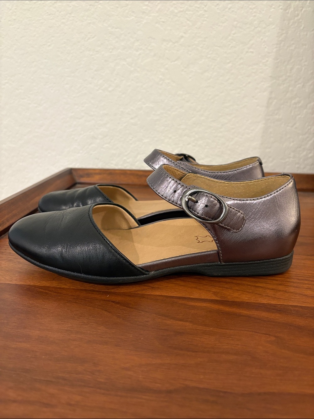 Dansko Two-Tone Mary Jane Flats in Black and Metallic silver.